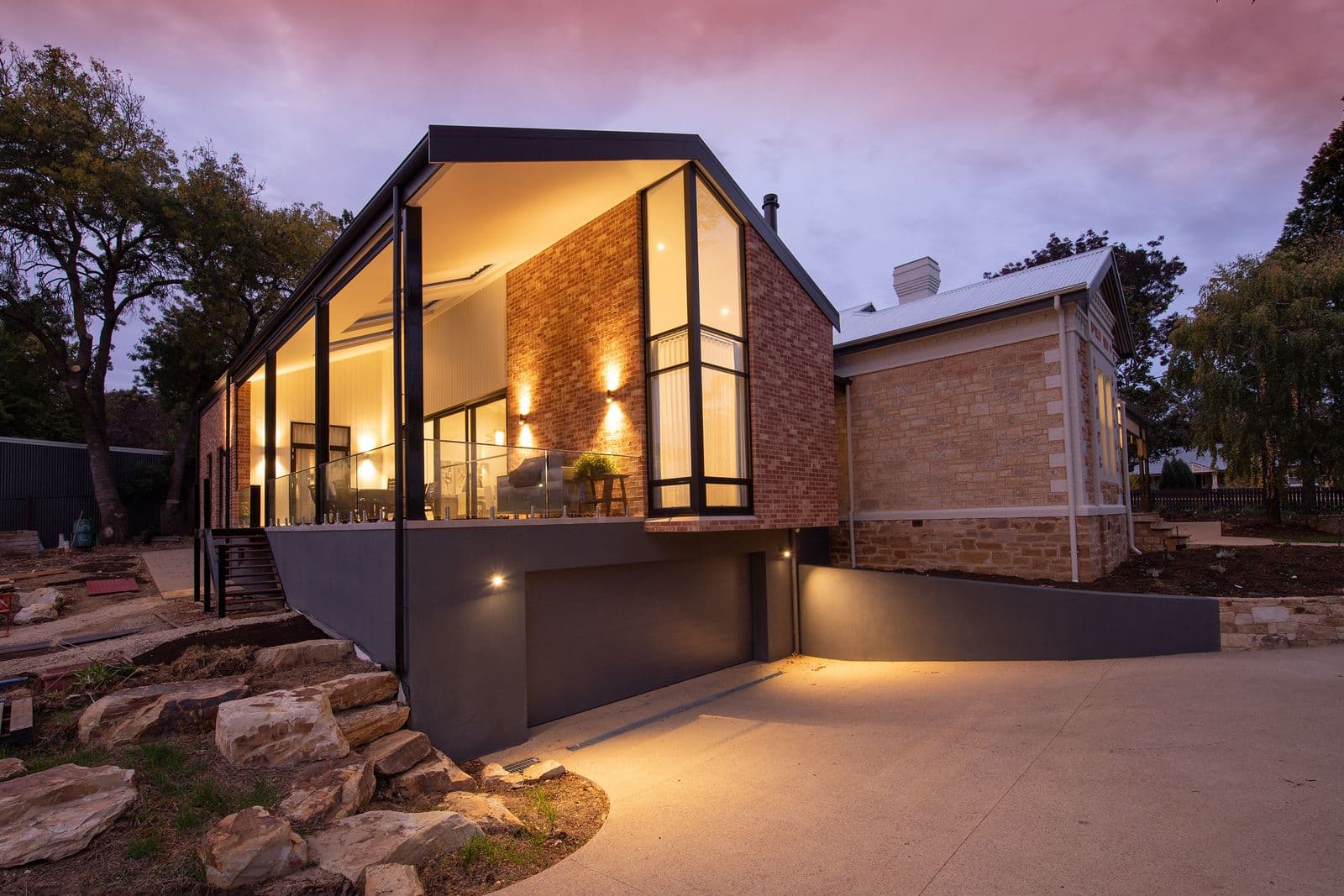 Modern renovated home exterior at dusk