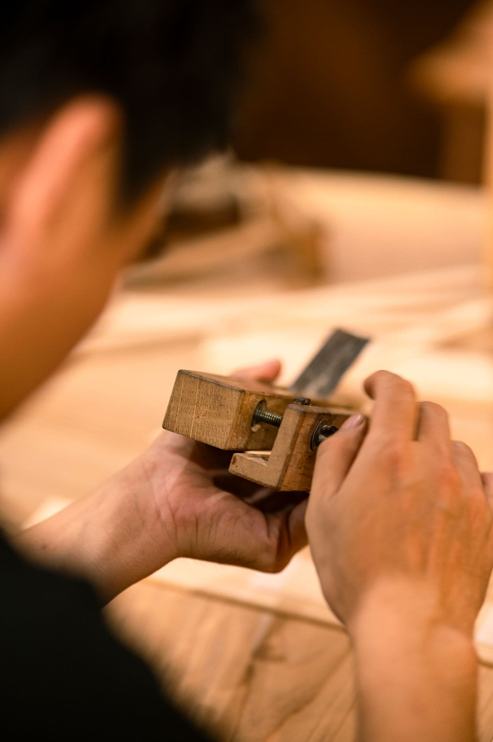 Craftsman working with wood in a workshop